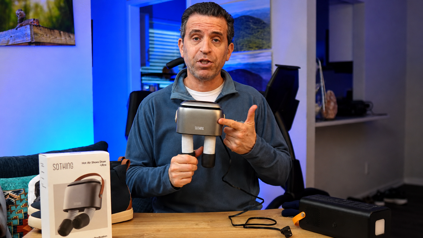 Creator presenting the SOTHING Ultra Boot Dryer and packaging