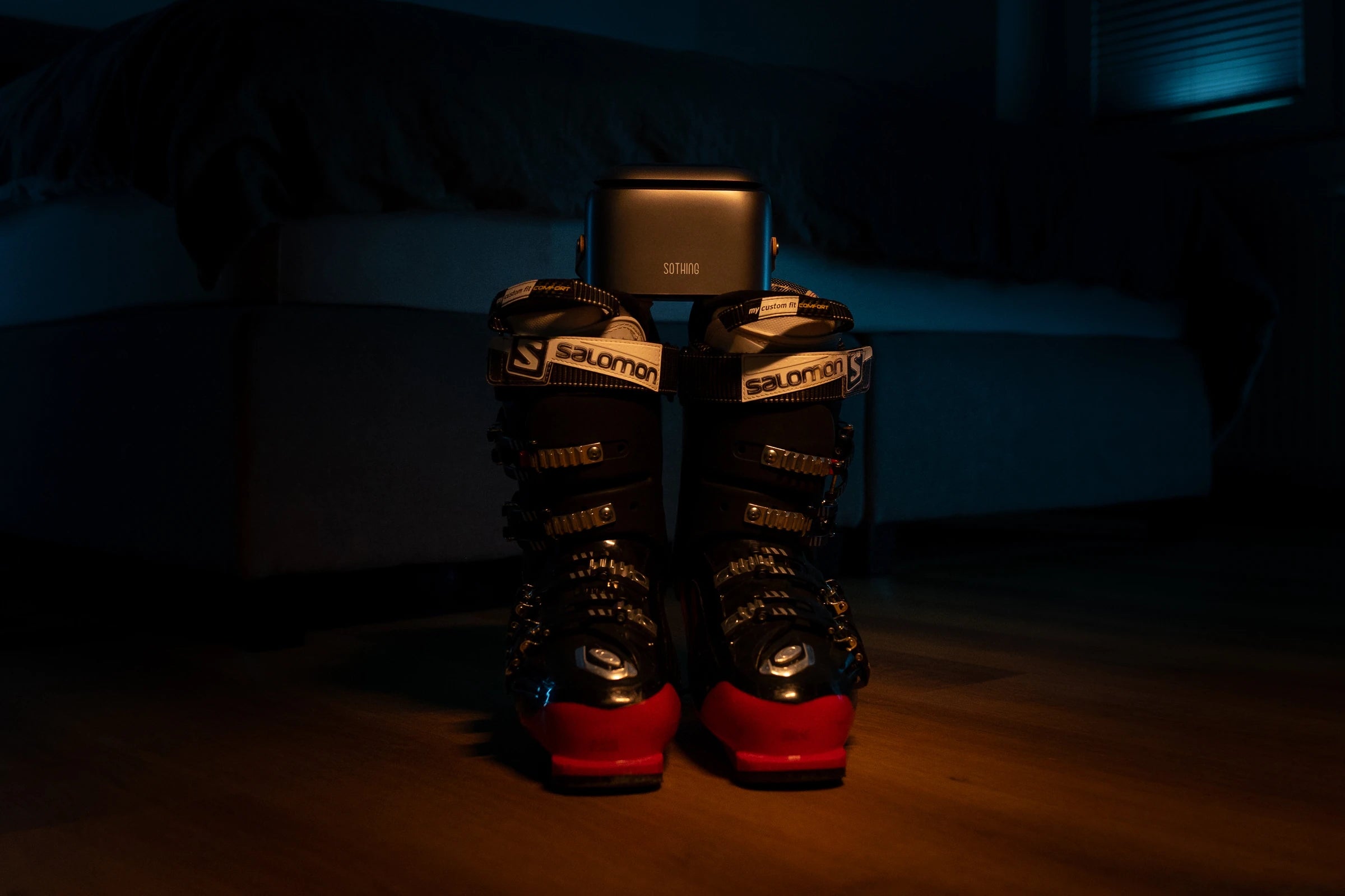 Original Ultra Grey and ski boots in evening light